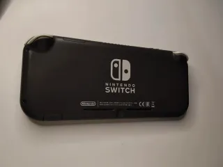 Nintendo Switch Lite Gris + Funda y Cargador