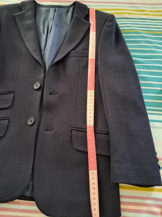 Chaqueta niño talla 8 azul en buen estado