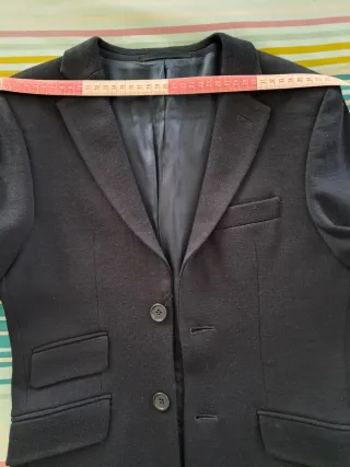 Chaqueta niño talla 8 azul en buen estado