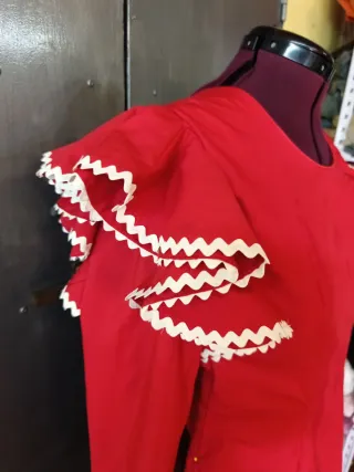 Traje de flamenca rojo con volantes