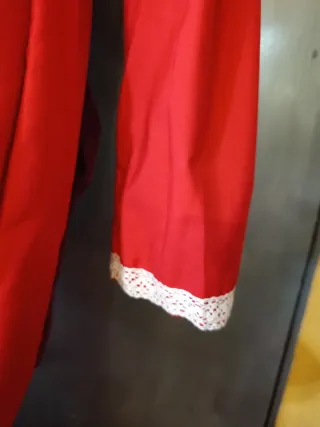 Traje de flamenca rojo con volantes