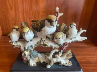 Figura de porcelana de pájaros
