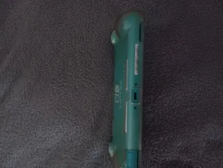 Nintendo Switch Lite + Cargador Original