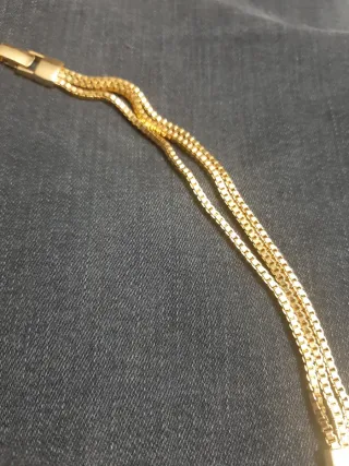 Pulsera chapada en oro tres mallas