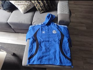 Cortavientos Adidas azul y negro