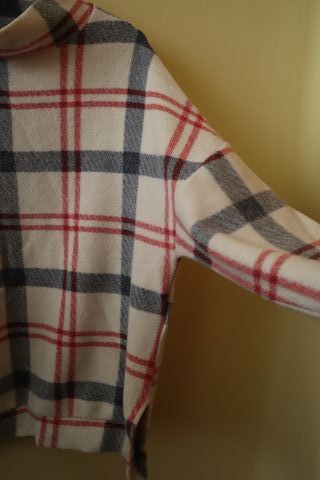 Jersey oversize cuadros cuello alto