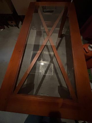 Mesa de comedor de madera y cristal