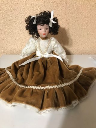 Muñeca de porcelana antigua Mide 27cm