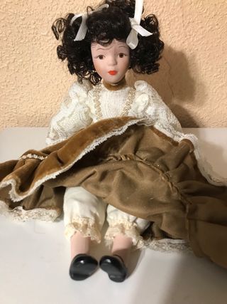 Muñeca de porcelana antigua Mide 27cm