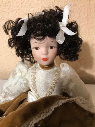 Muñeca de porcelana antigua Mide 27cm
