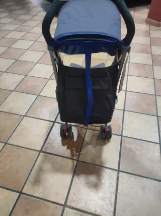 Cuna bebé con ropa, carricoche y cojin lactante