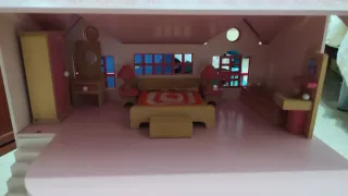 Casa de muñecas rosa