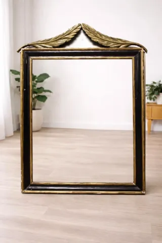 Marco de espejo elegante negro y dorado