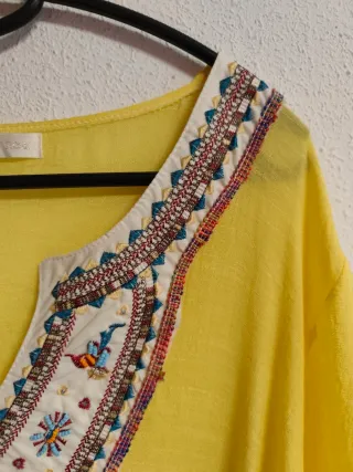 Blusón de chica talla 42-44.