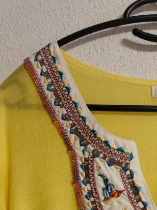 Blusón de chica talla 42-44.