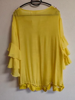 Blusón de chica talla 42-44.