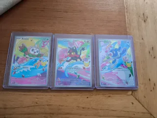 Trío de cartas Pokémon: Rowlet, Popplio, Litten.