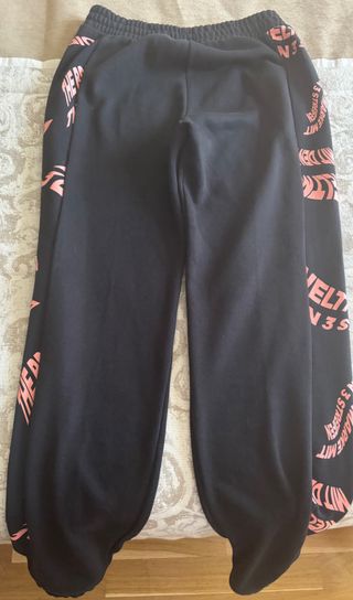 Abbigliamento sportivo Adidas per ragazze, nero e rosa.