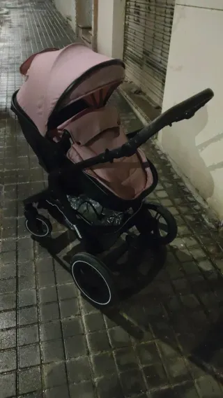Carrito de bebé rosa