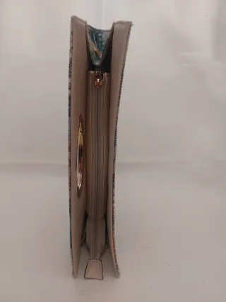 Bolso de mano floral con asa dorada