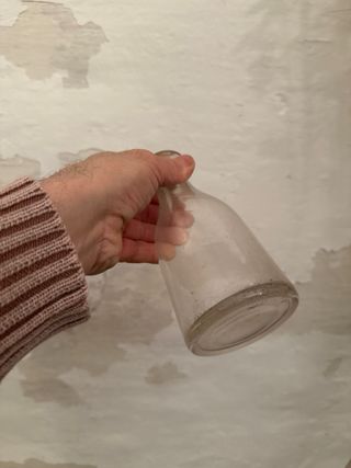 Botella de vidrio con corcho