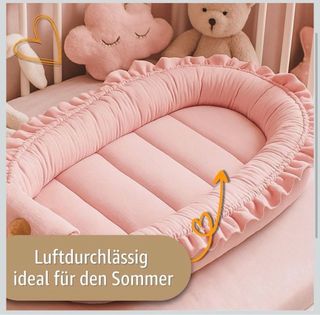 Nido para bebé rosa con volantes