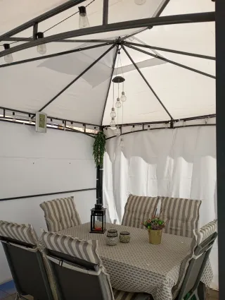 Pérgola de terraza metálica y tela