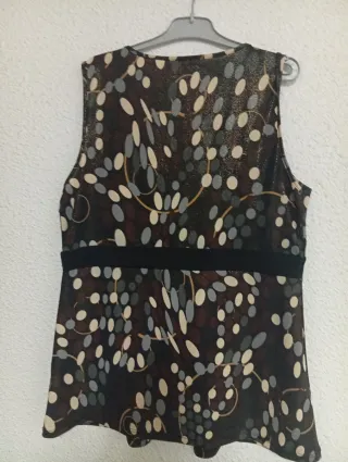 Blusa M punto roma marrón y dorada.45 cm