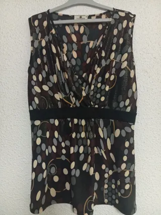 Blusa M punto roma marrón y dorada.45 cm