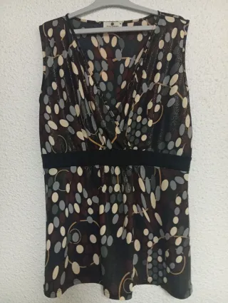 Blusa M punto roma marrón y dorada.45 cm