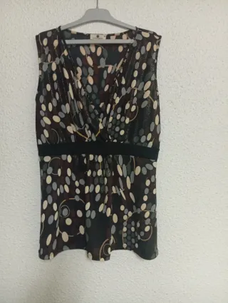 Blusa M punto roma marrón y dorada.45 cm