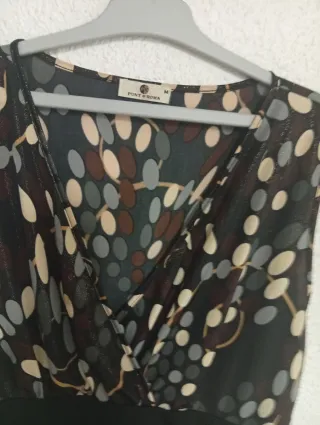 Blusa M punto roma marrón y dorada.45 cm