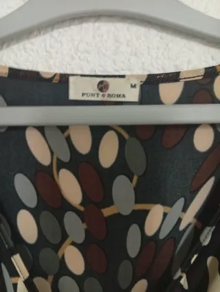 Blusa M punto roma marrón y dorada.45 cm