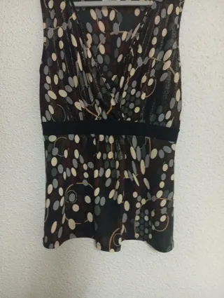 Blusa M punto roma marrón y dorada.45 cm