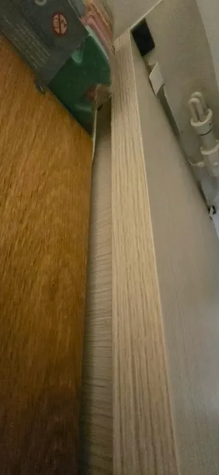 Cama abatible vertical beige de madera