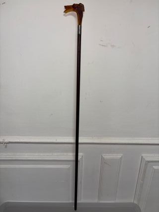 Bastone antico con testa di cane