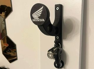 Soporte para colgar casco de moto