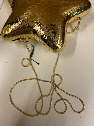 Bolso fiesta Zara estrella dorado