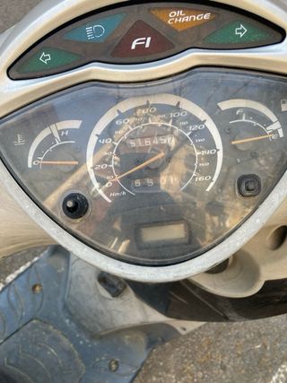 Honda SH125i Scooter Negra y Plateada