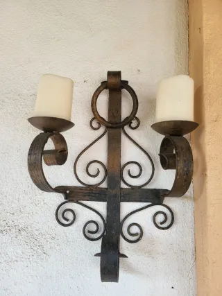 Candelabro de metal dorado y marron