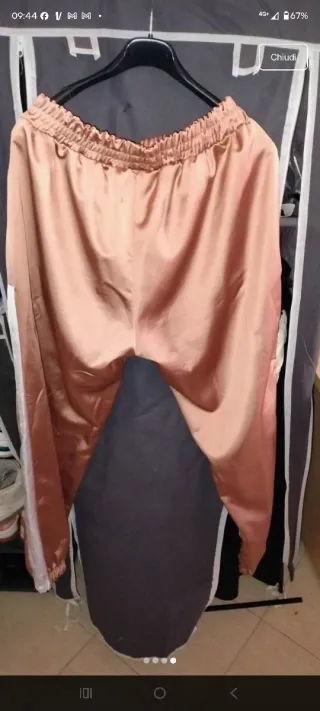 Tuta sportiva rosa e bianca
