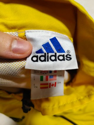 Giacca a vento Adidas vintage gialla/nera