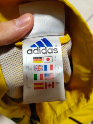 Giacca a vento Adidas vintage gialla/nera