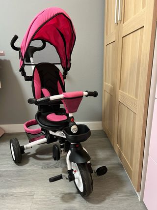 Triciclo para bebé con toldo rosa