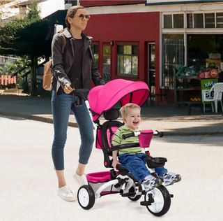 Triciclo para bebé con toldo rosa