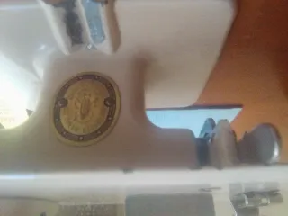 Máquina de coser Singer antigua de juguete