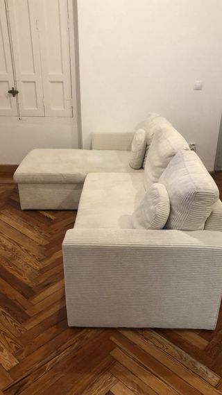 Sofá cama blanco con chaiselongue