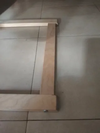 Tumbona de madera y tela beige