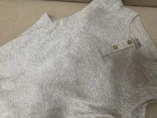 Pijama fotografía bebé Kiabi gris atrezzo fotos