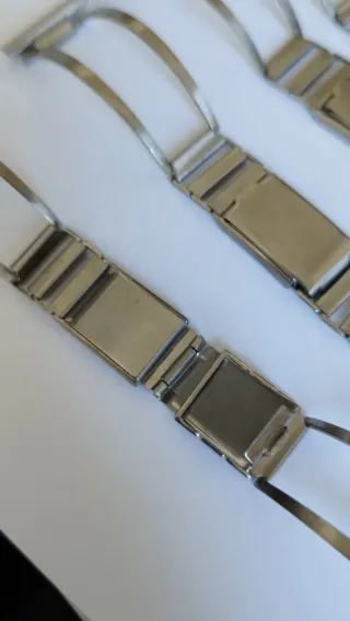 Lote de 5 brazaletes de acero tipo rally de 22mm